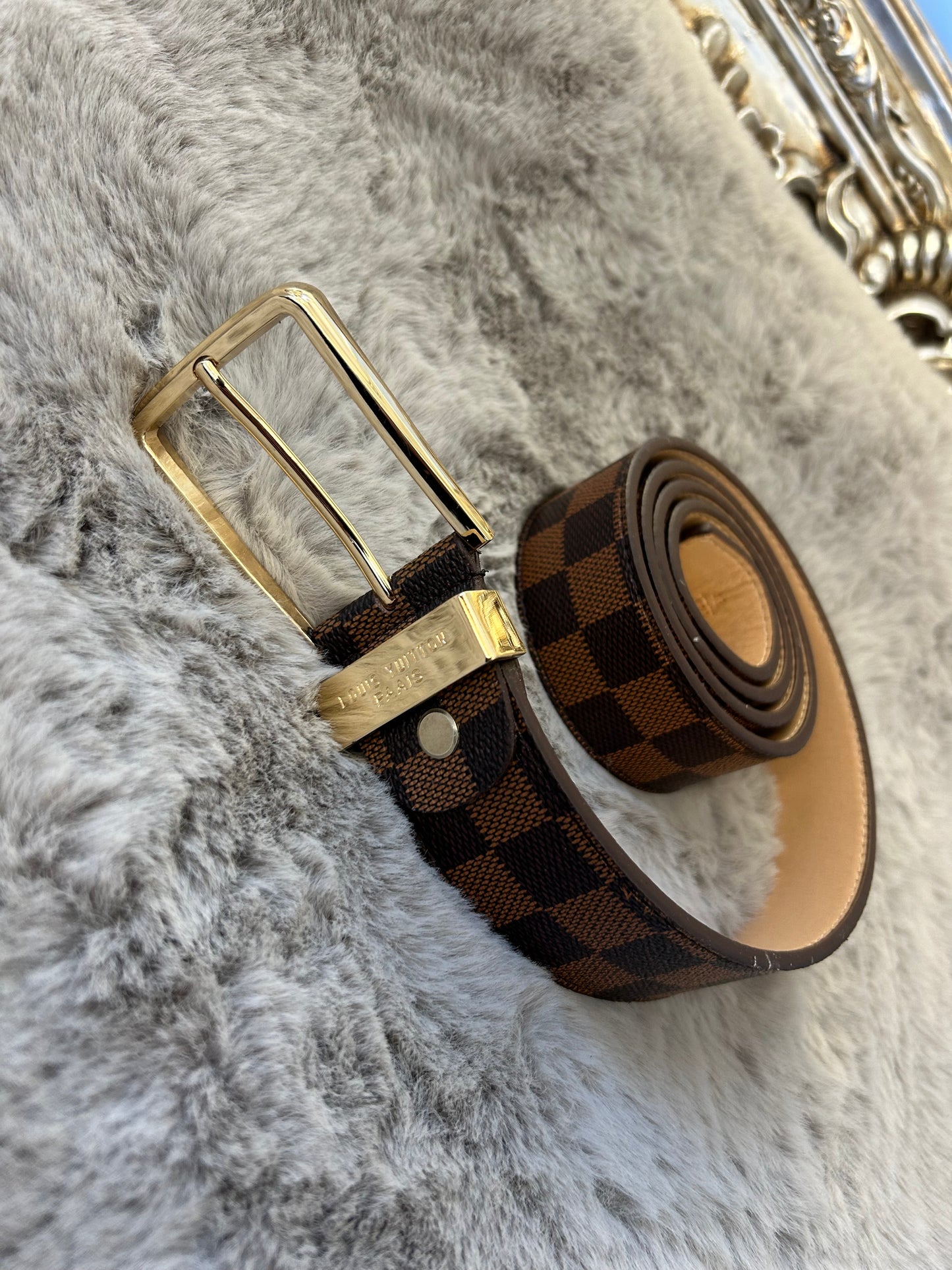 Checked gold belt