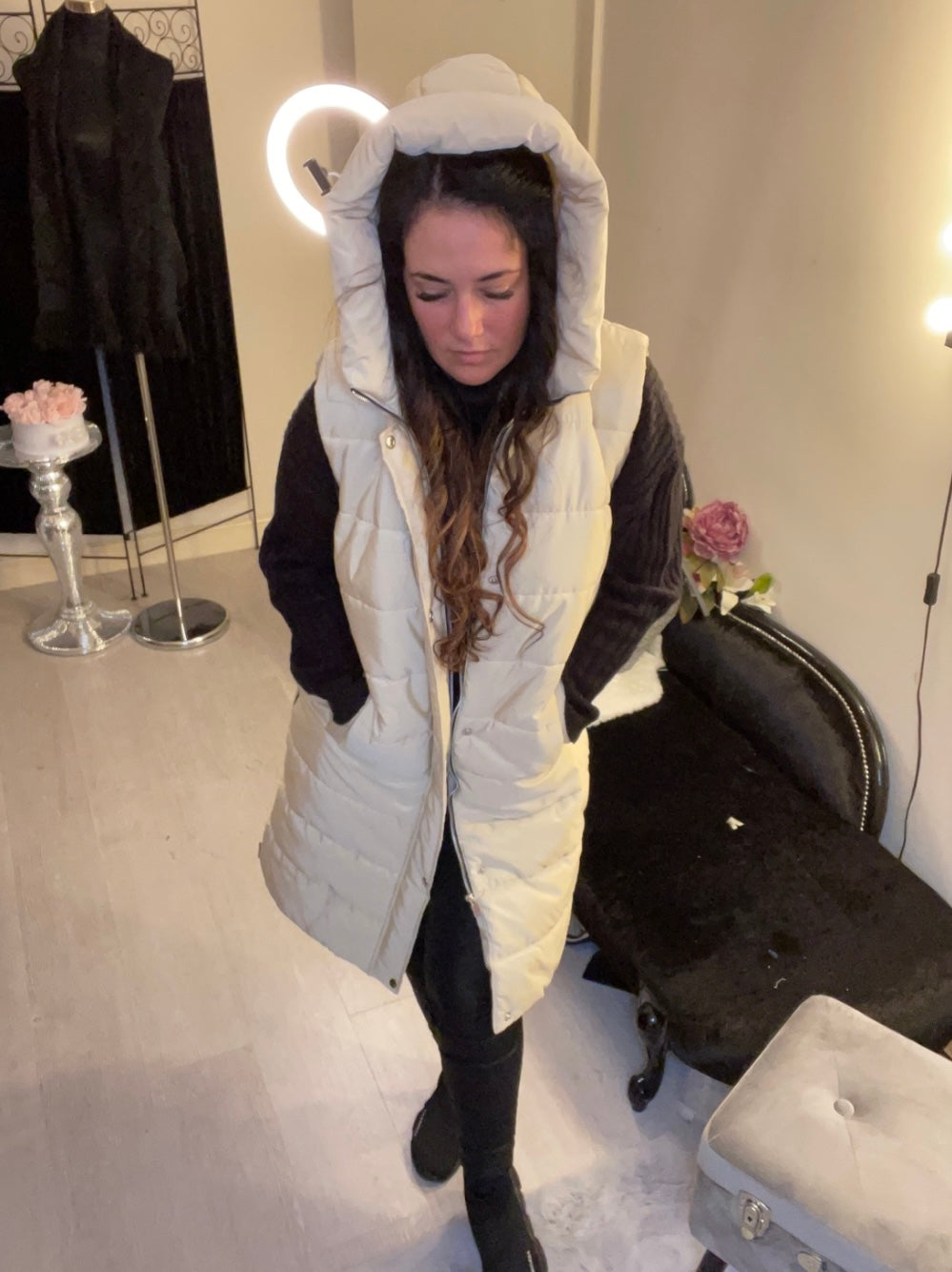 Cream long line body warmer with side zips for walking and a hood