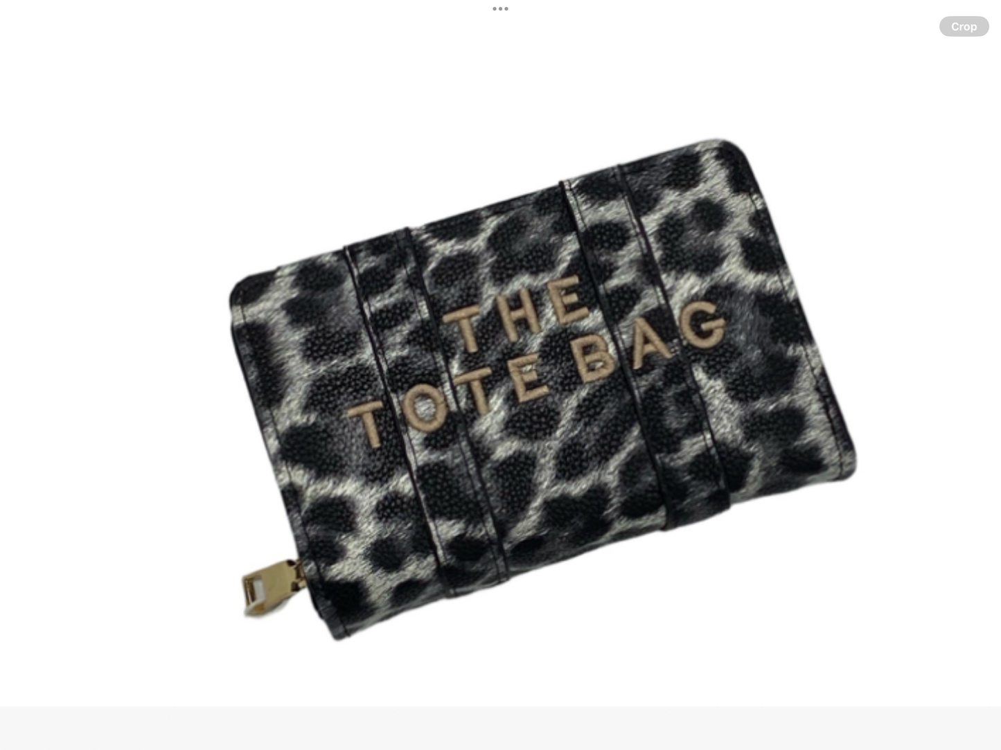 Leopard print tote purse with 'THE TOTE BAG' text on