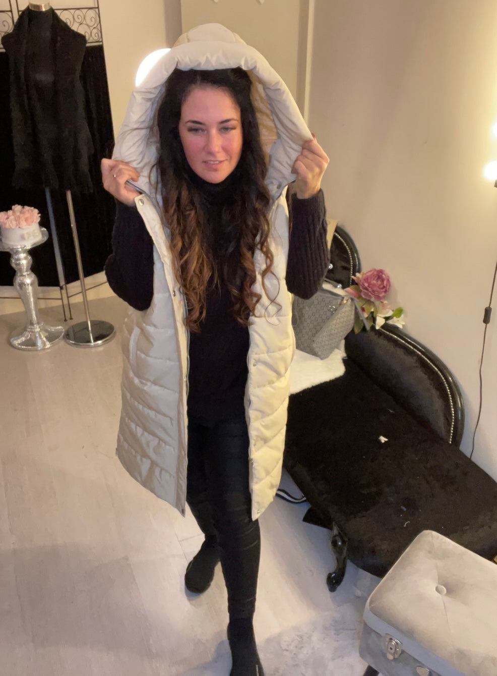 Cream long line body warmer with side zips for walking and a hood