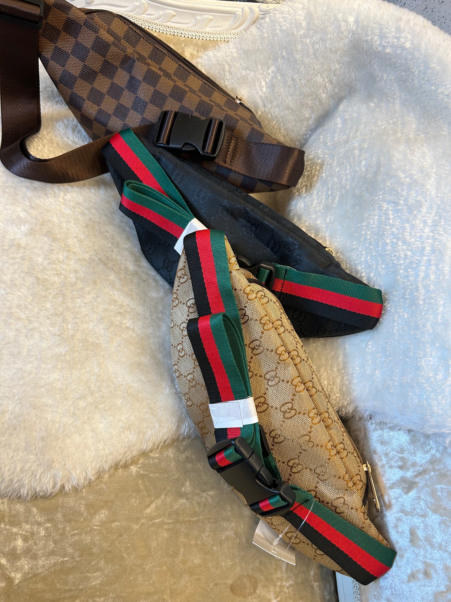 Brown buckle fastening bum bags