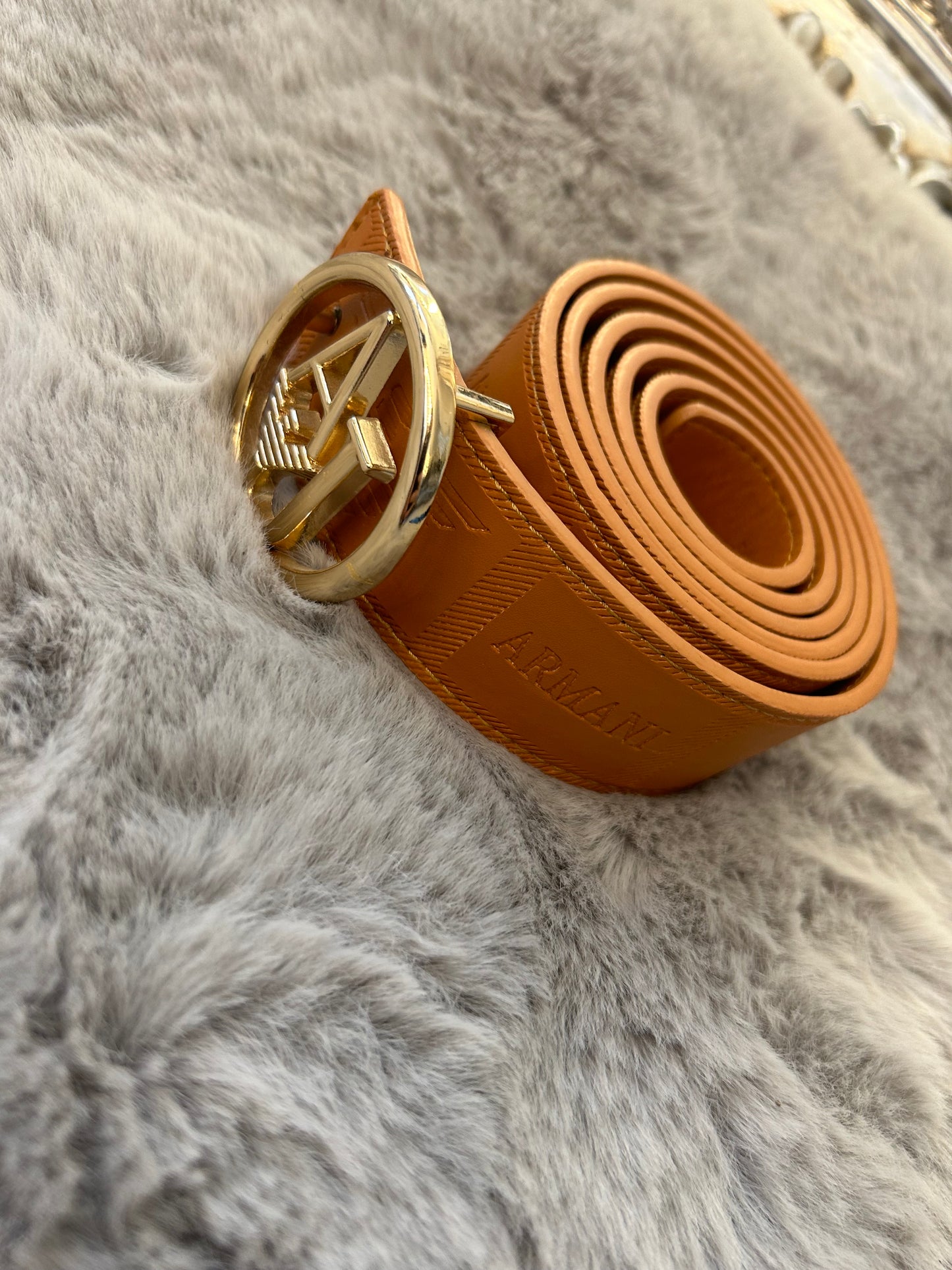 Brown and gold belt