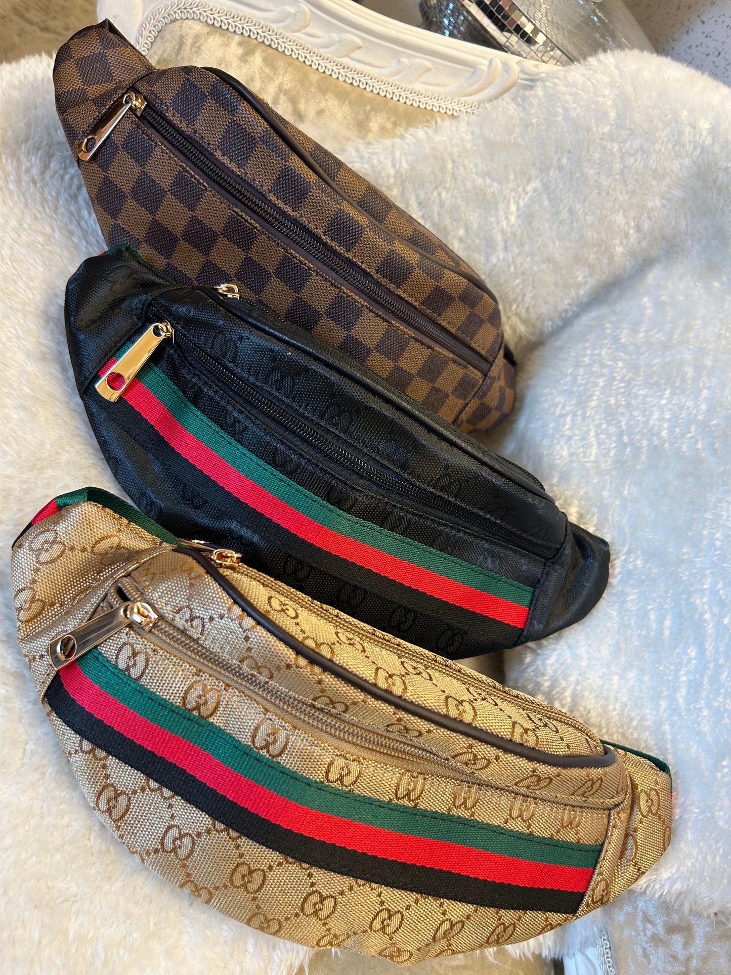 Brown buckle fastening bum bags