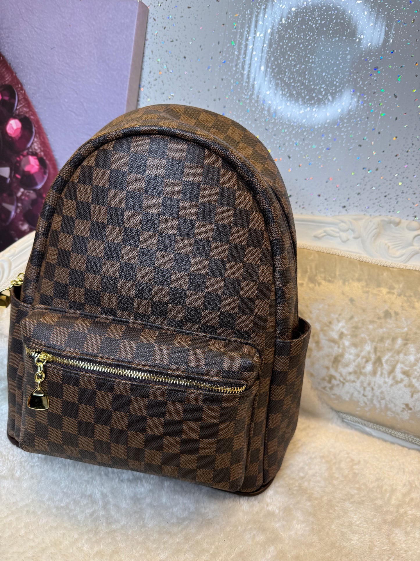 Brown checked rucksack backpack with gold detailing