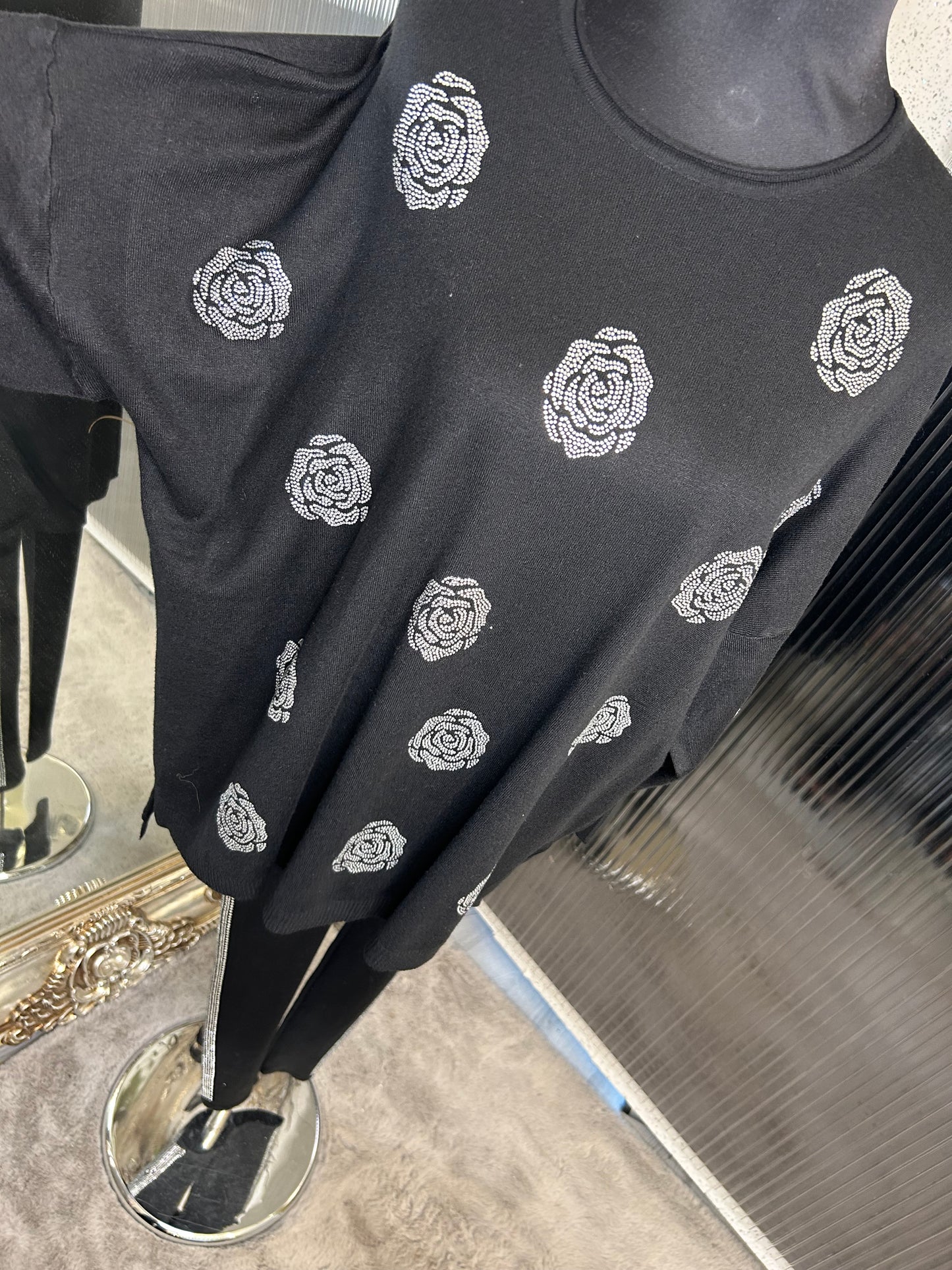 A black legging lounge wear set with crystal flower details