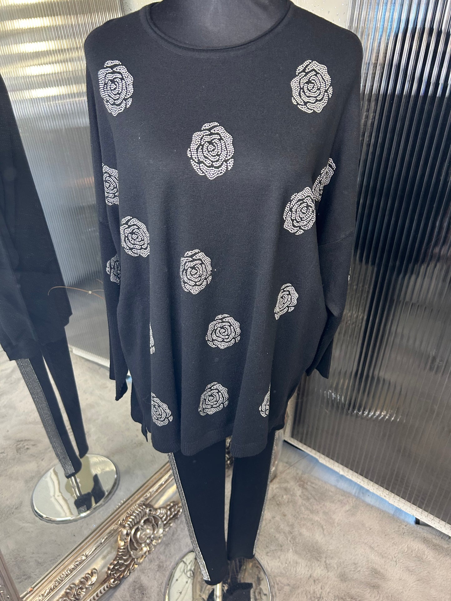 A black legging lounge wear set with crystal flower details