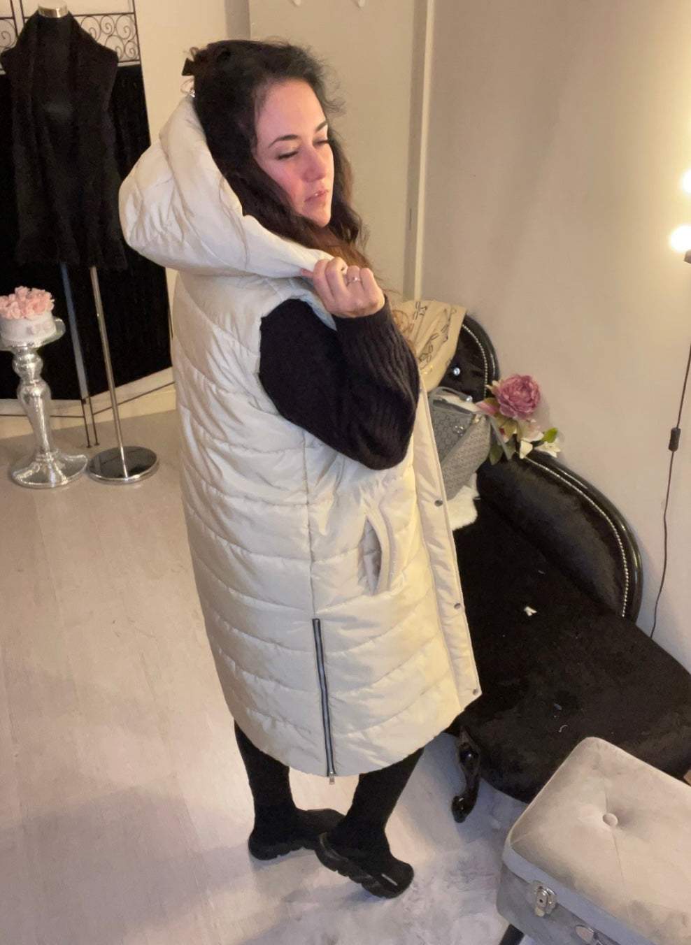Cream long line body warmer with side zips for walking and a hood