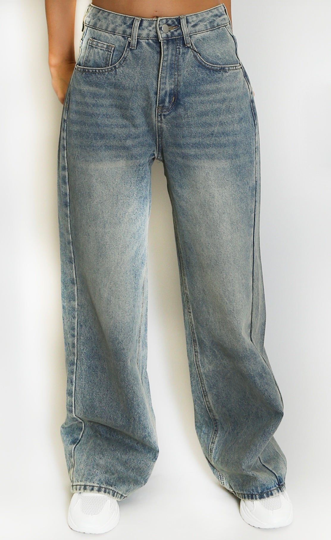 Blue slouchy jeans worn by a person