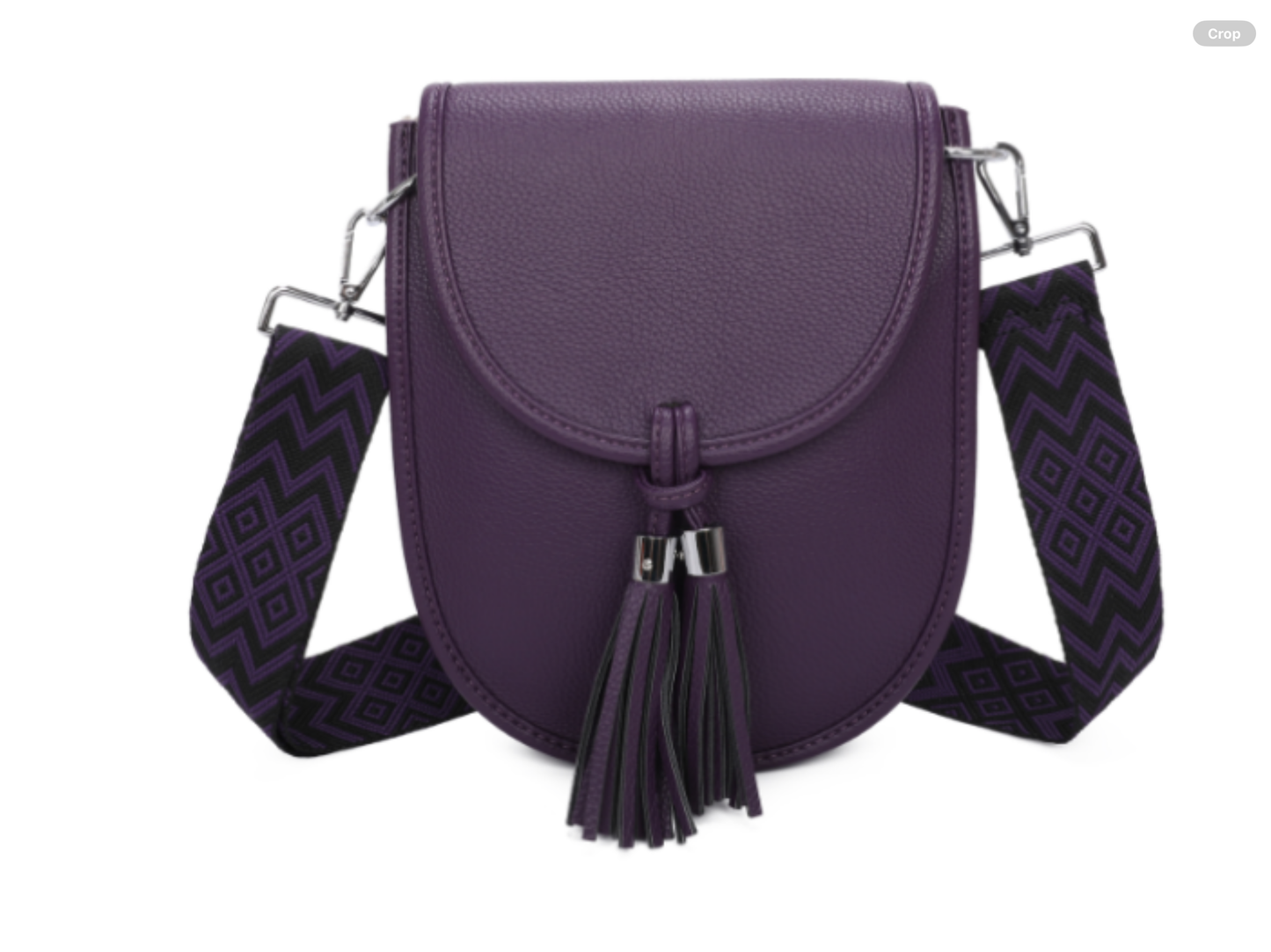 Purple crossbody bag with a tassel and detail design strap