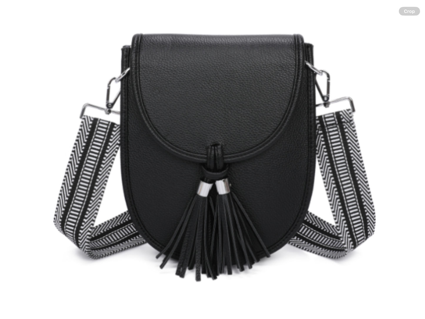 Black handbag with tassels and a striped strap