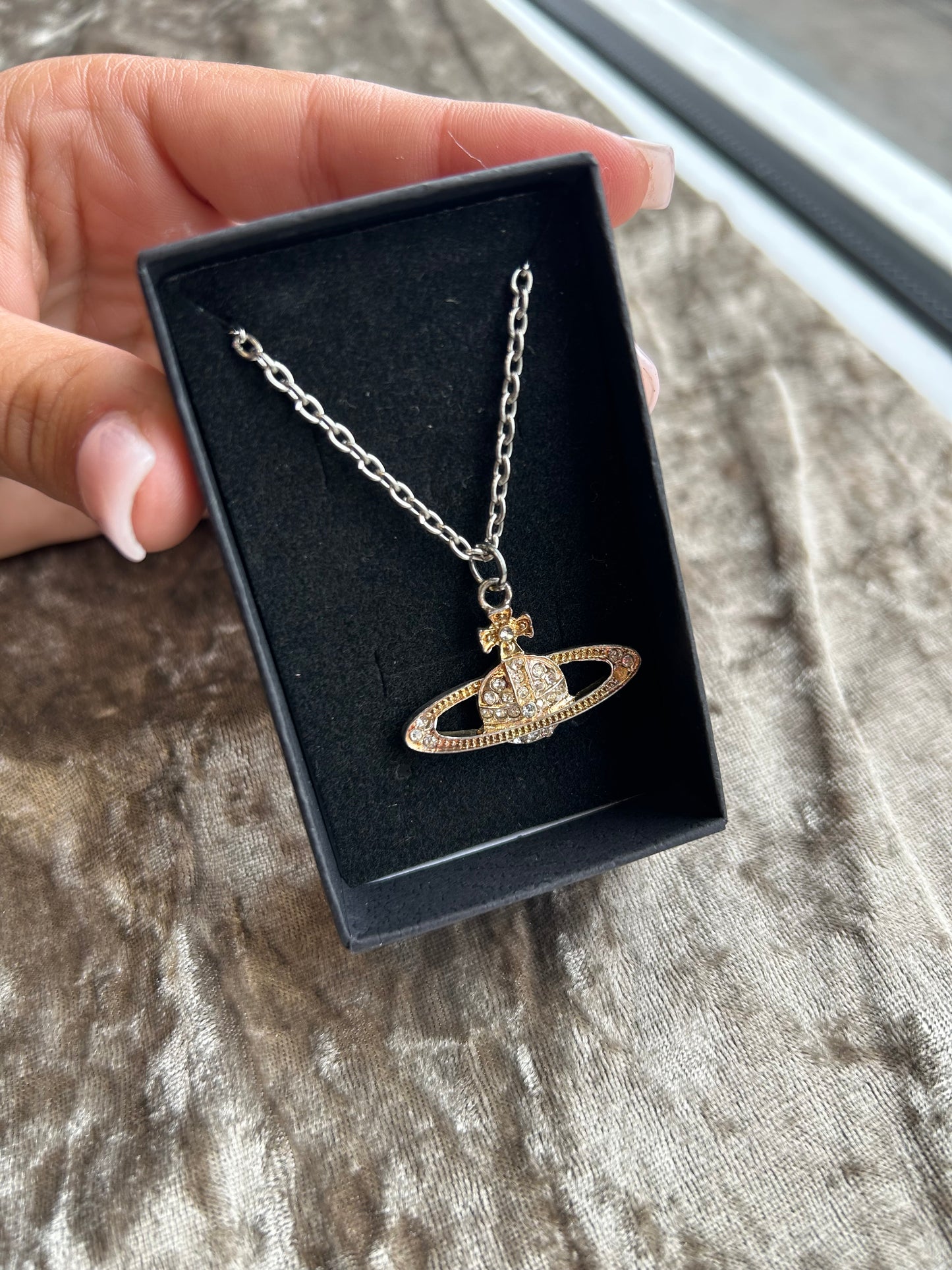 Gold planet necklace
