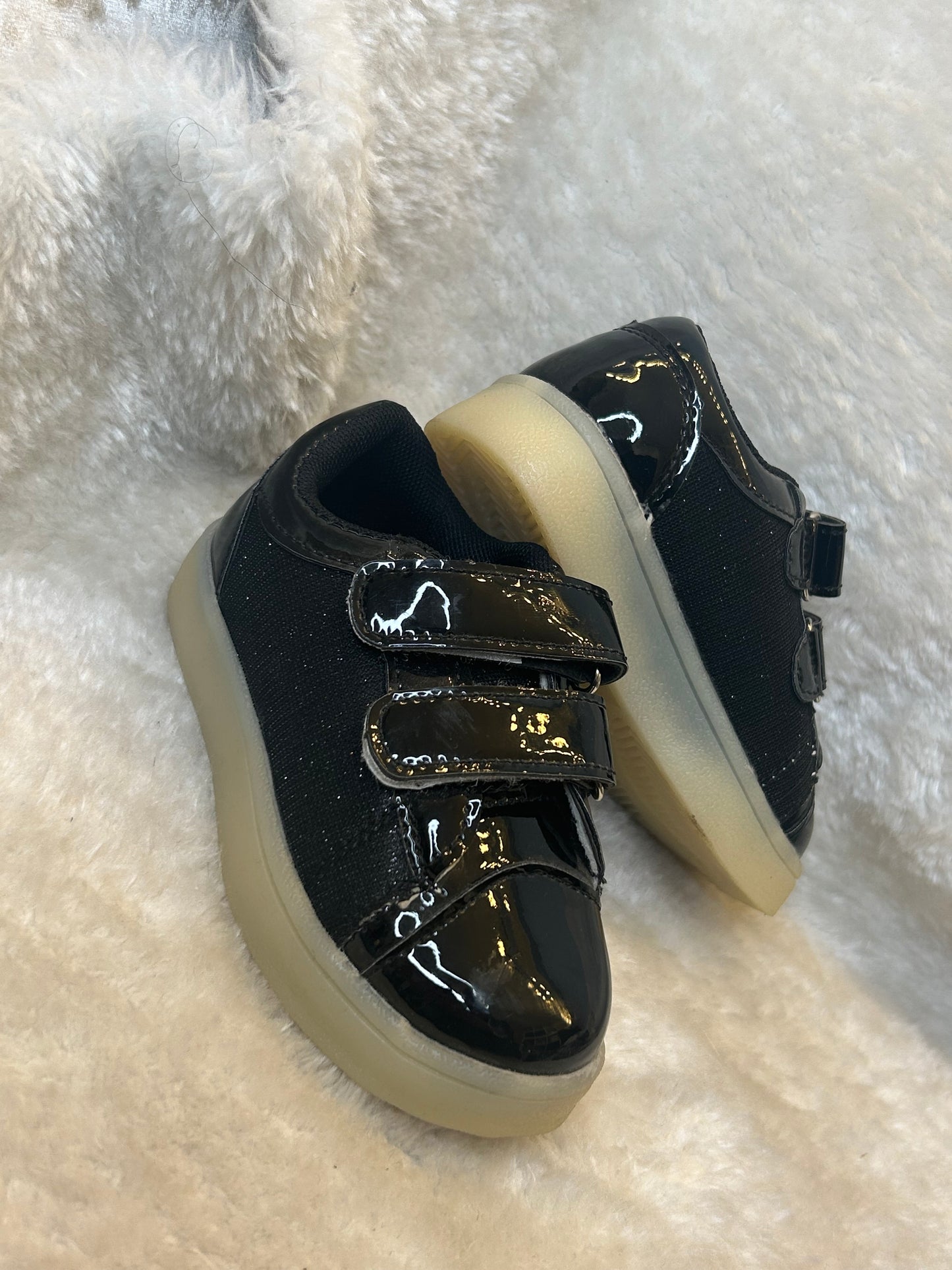 Children’s black patent and fabric trainers with double velcro straps and chunky light sole