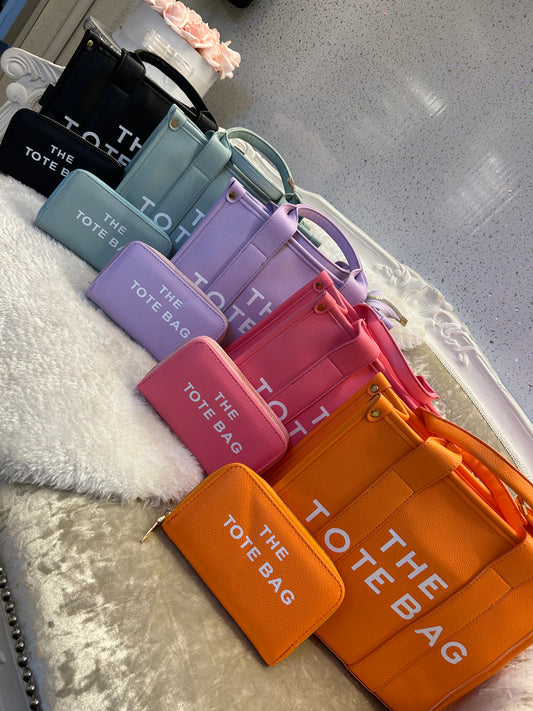 A collection of colourful tote bags with matching purses, with the text 'TOTE BAG' printed on the bags.