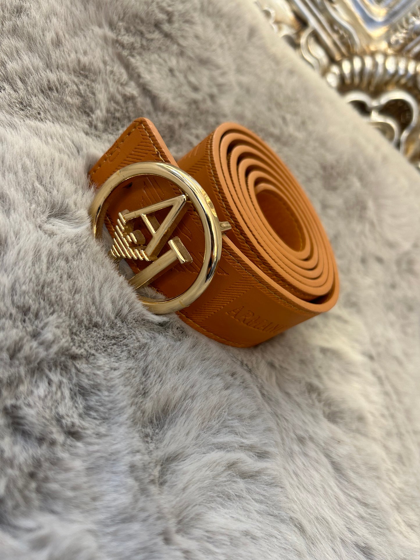 Brown and gold belt