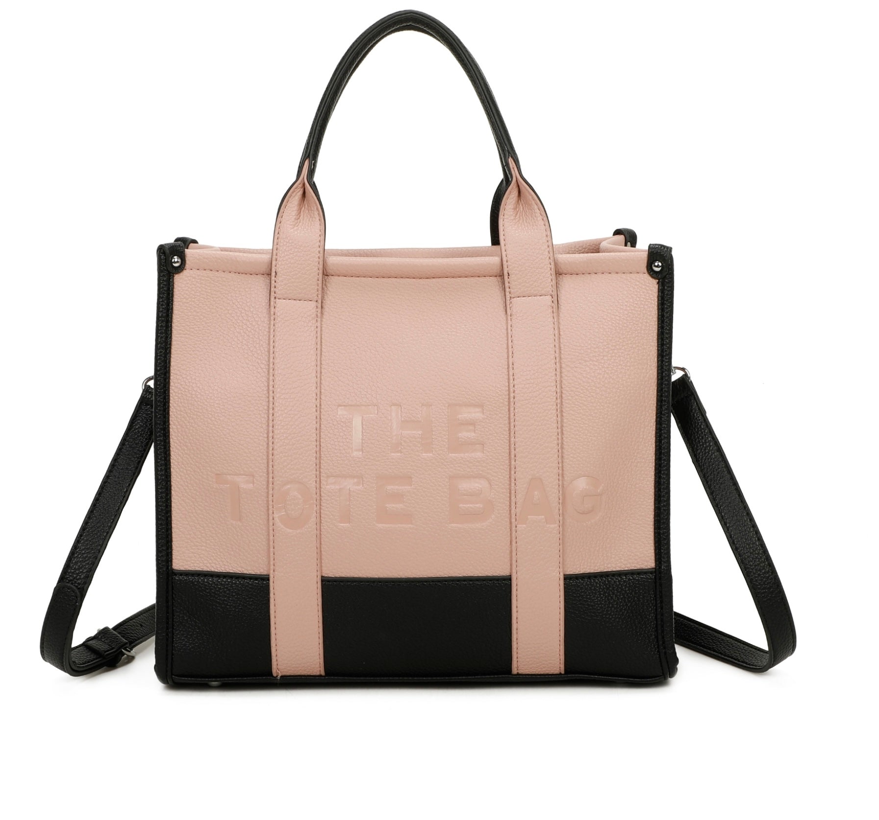 Pink and black handbag with 'The tote bag ‘ embossed into the front with silver hard wear