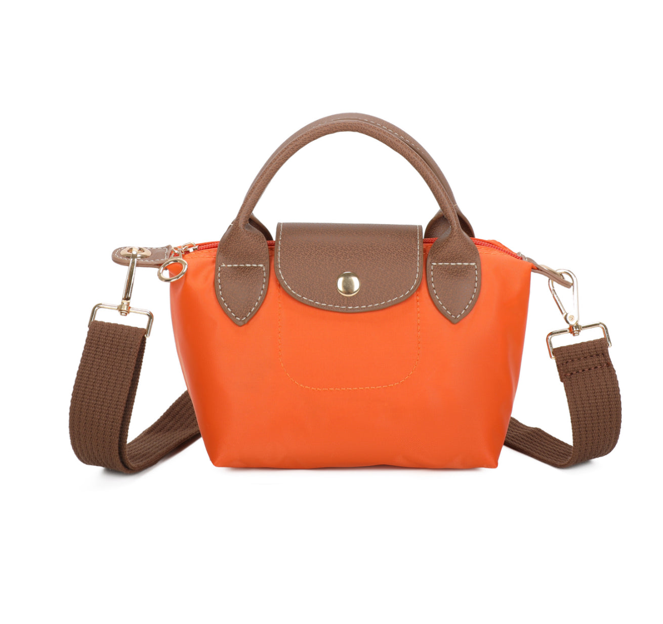 Orange handbag with brown handles and strap on a white background