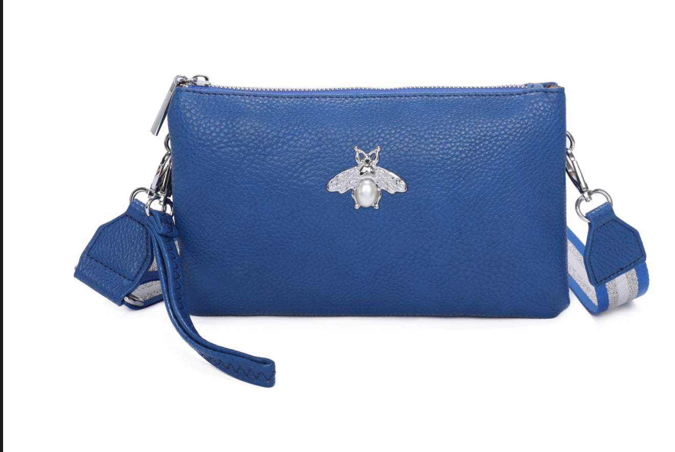 Blue handbag with a bee emblem