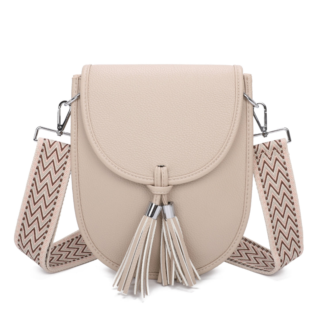 Beige handbag with a decorative strap and tassel