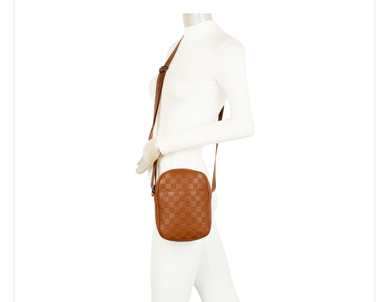 Mannequin wearing a brown woven handbag crossbody bag