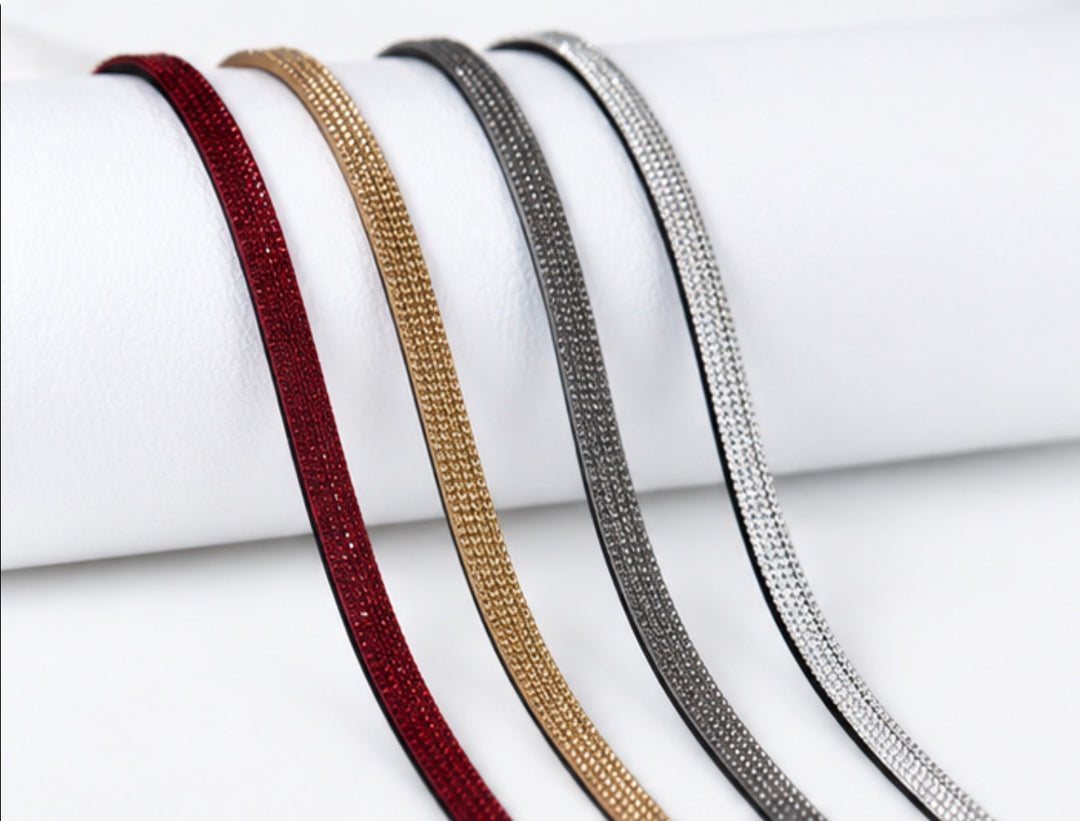 Crystal sparkle lanyards in red, gold, grey and silver with silver-tone keyring and clasp attachments.
