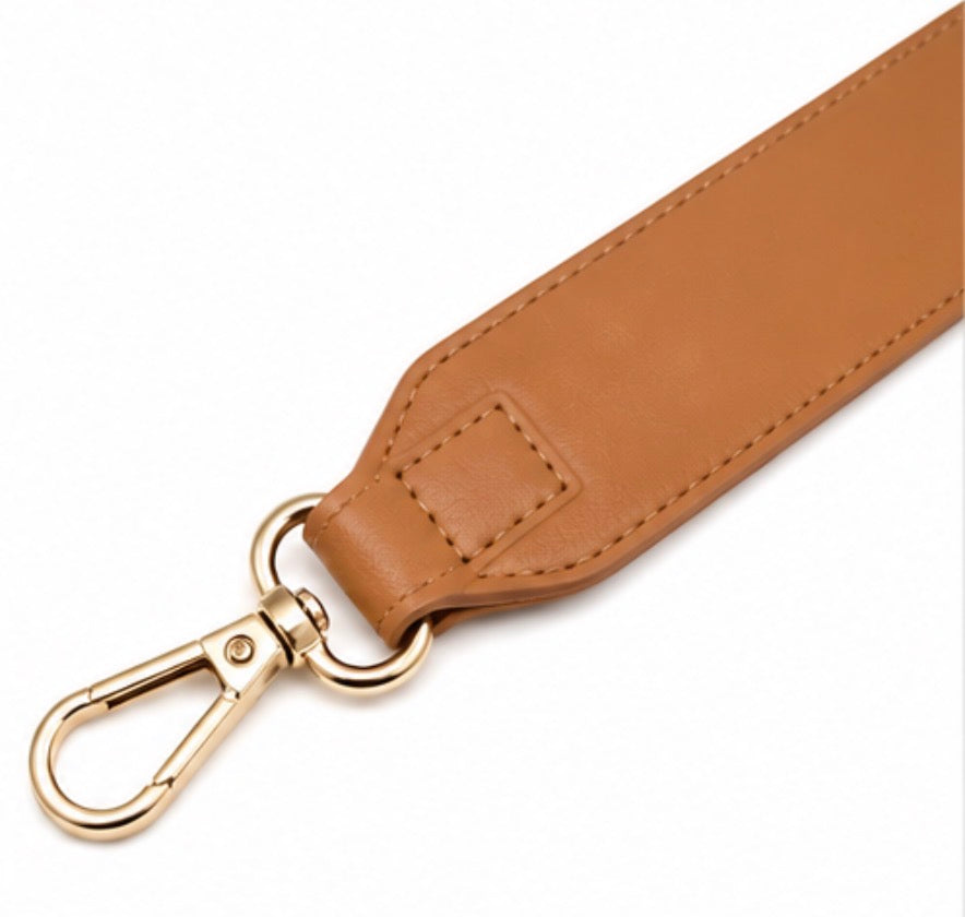 Tan handbag strap with gold hardware