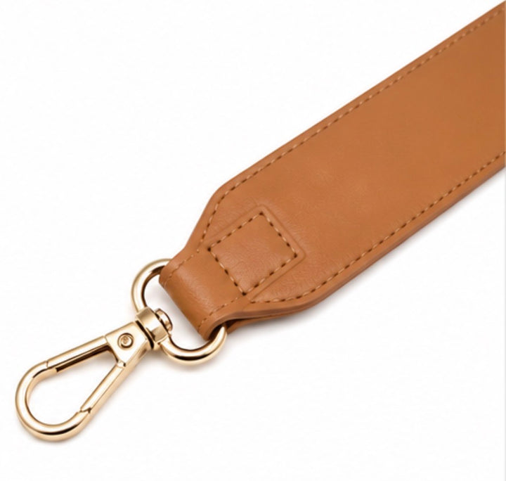 Tan handbag strap with gold hardware