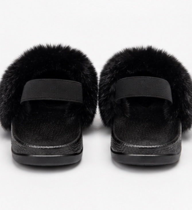 Black children’s fluffy faux fur sliders with elastic back strap