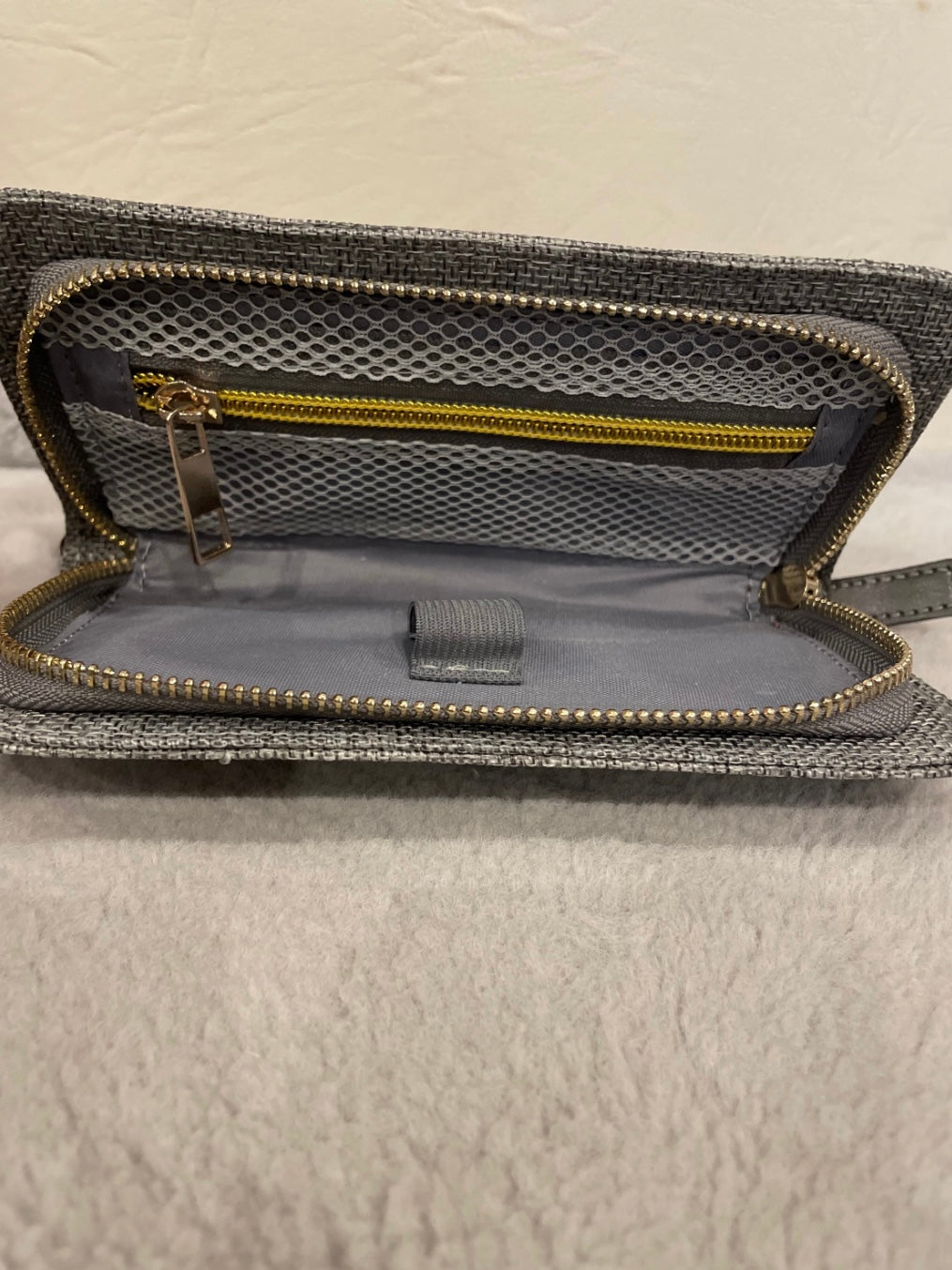 Grey tweed purses with zip gold detailing 