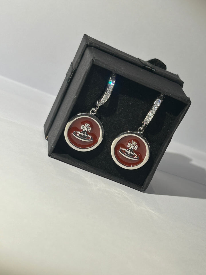 Burgundy planet dangle earrings