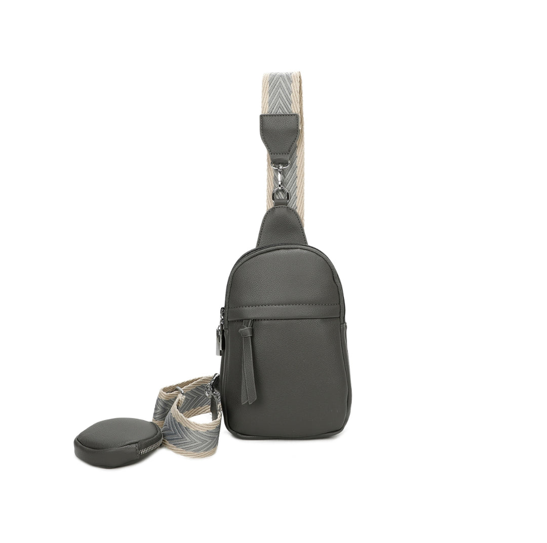 Grey faux-leather crossbody bag with a chevron-patterned strap and small detachable coin pouch.