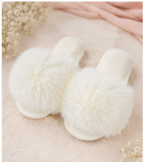 Faux fur slip on children’s slippers in white 
