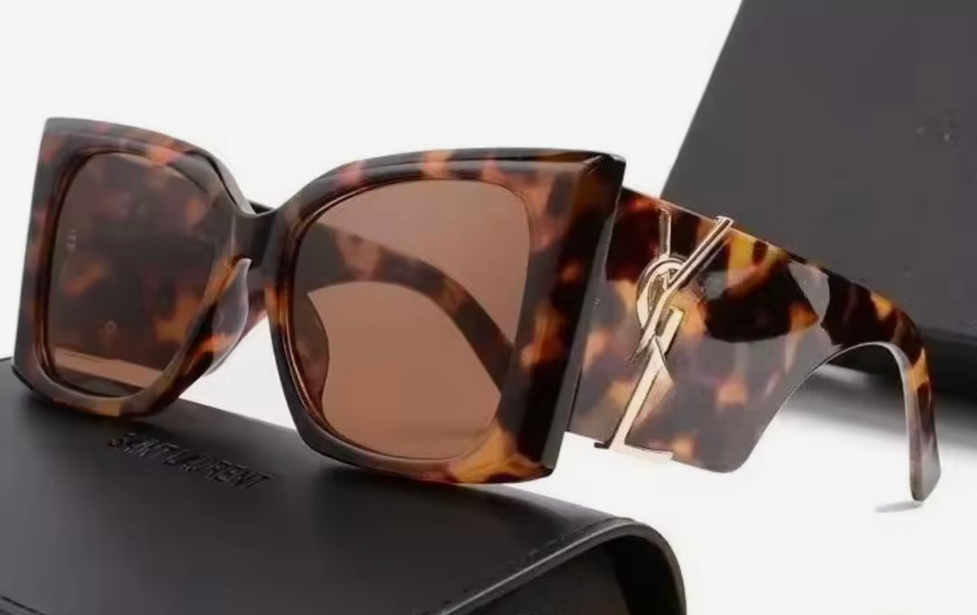 Tortoiseshell sunglasses with gold detailing 