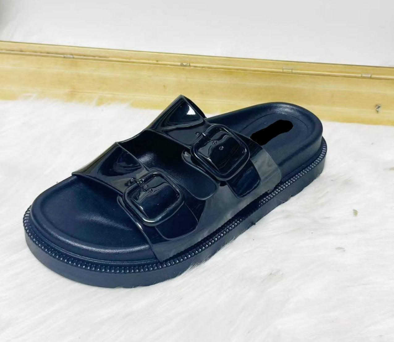 Black patent sandal with buckle design