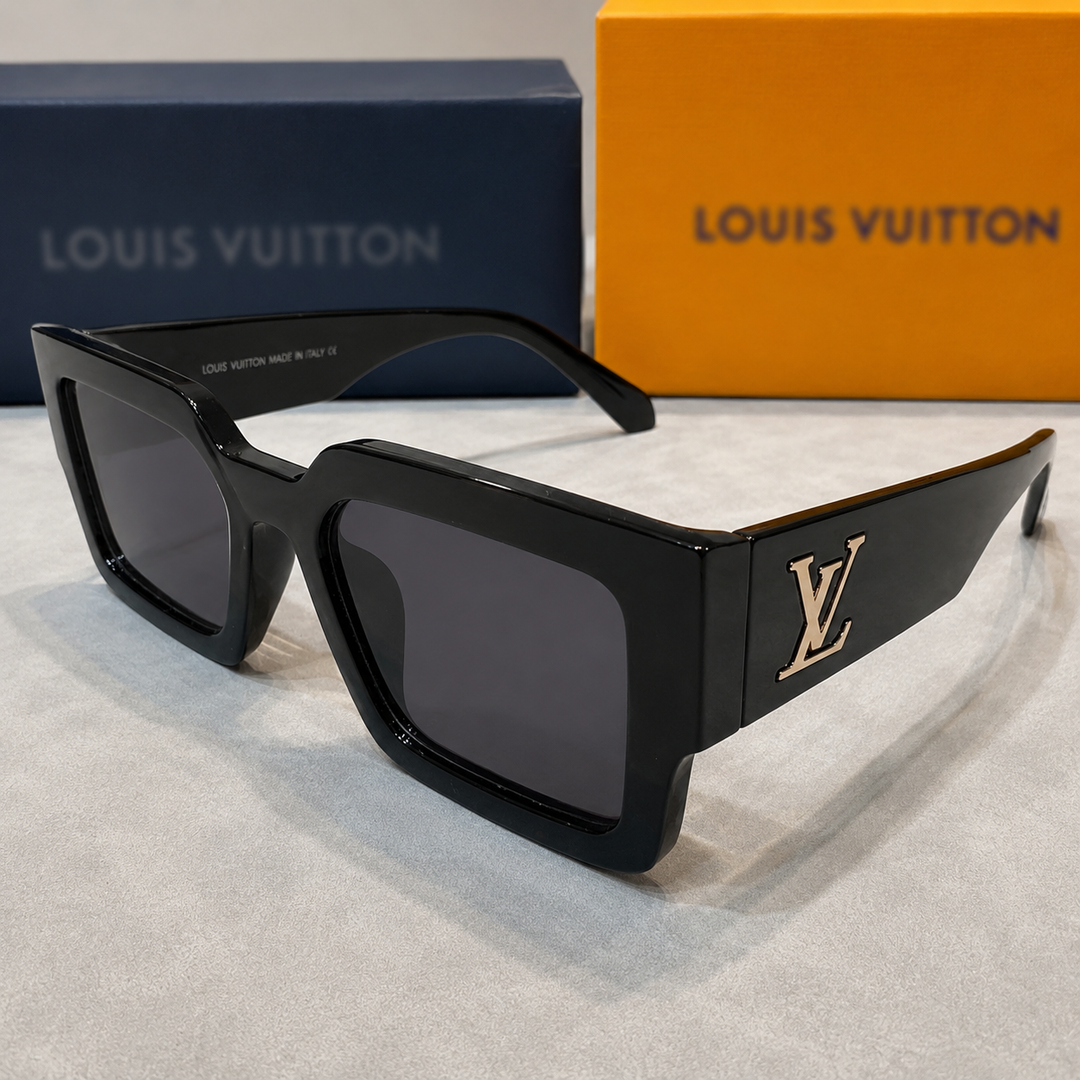 Chunky black sunglasses with gold detail 