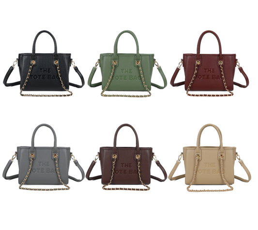 Set of six handbags in different colours with 'The tote bag' branding. And a gold chain detailing 
