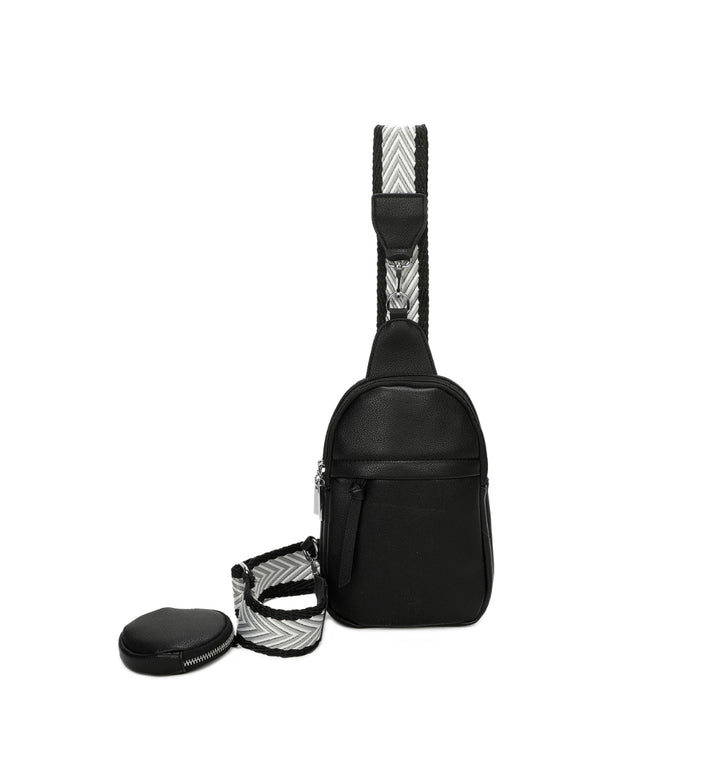 Black faux-leather crossbody bag with a chevron-patterned strap and small detachable coin pouch.