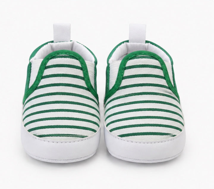 Soft baby crib shoes with striped pattern and flexible non-slip white sole 