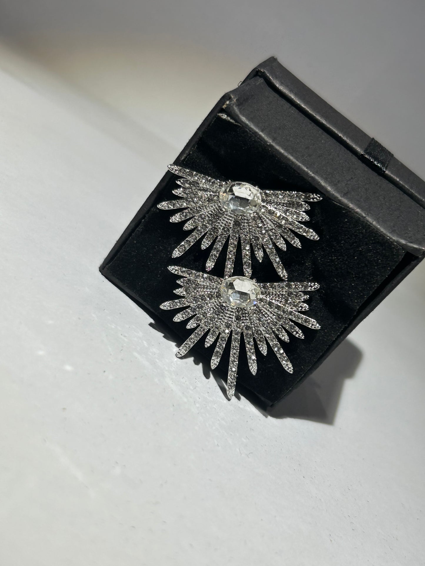 Large half star crystal earrings