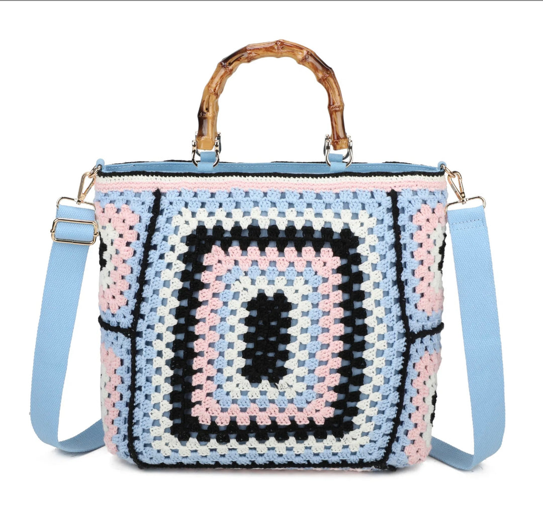 Blue based crochet grab bags with bamboo handles and a top zip closure