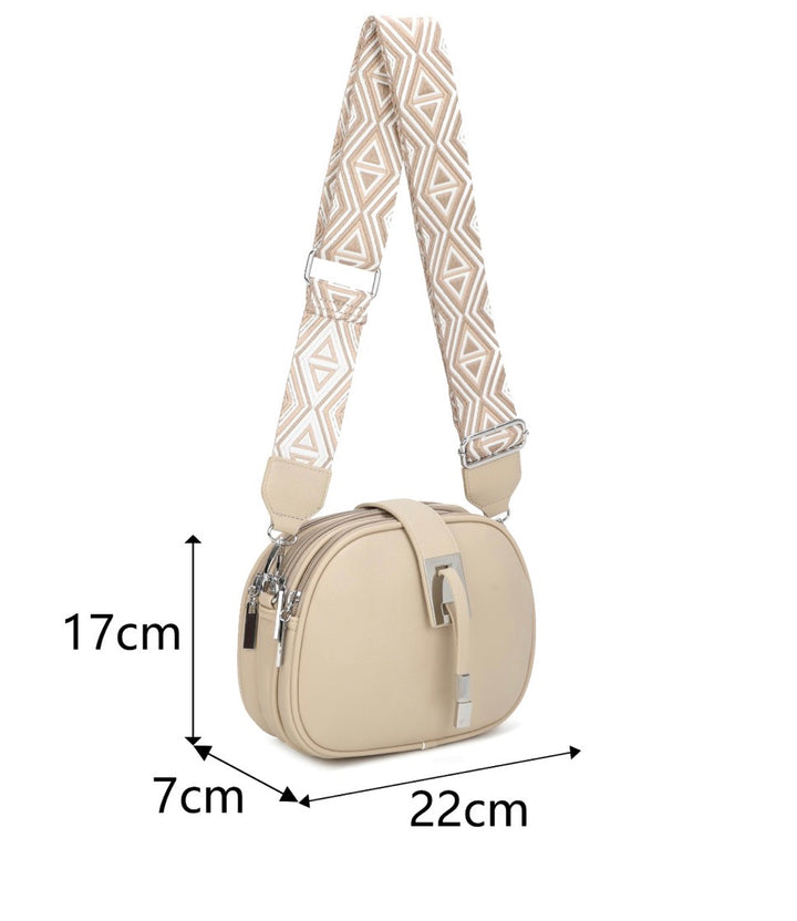 Beige handbag with a patterned strap, shown with dimensions