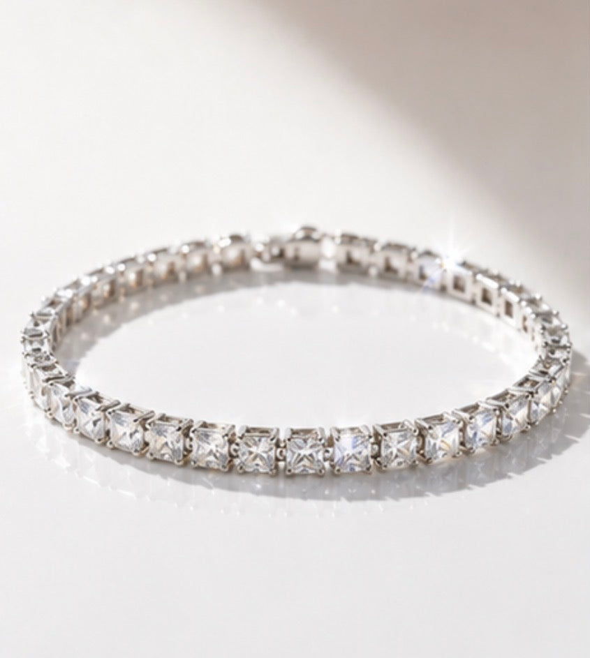 Silver tennis bracelet featuring sparkling square-cut cubic zirconia stones