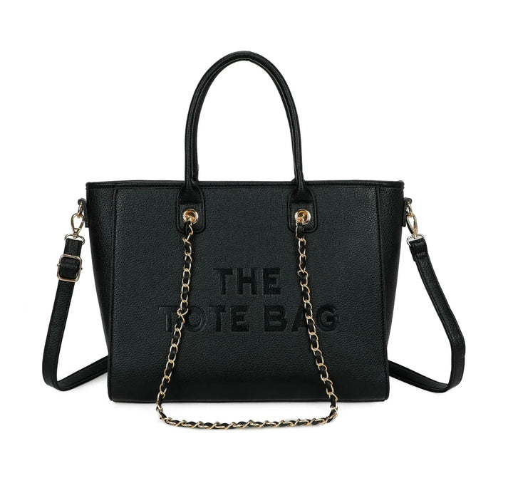 Black tote bag with chain strap detail 