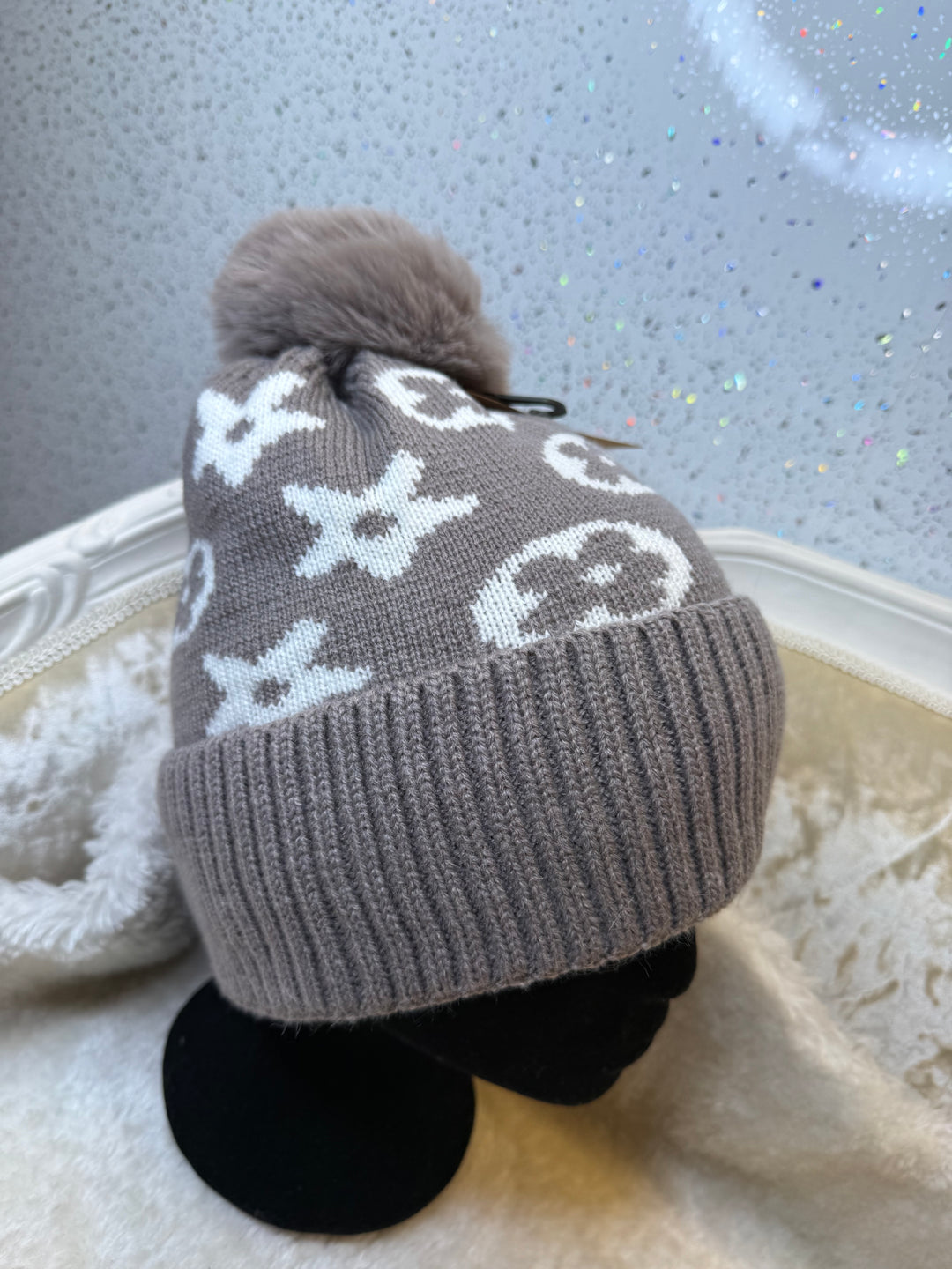 Flower detail bobble hats