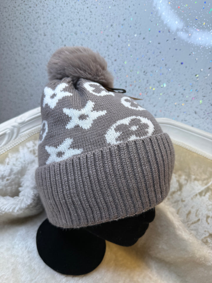 Flower detail bobble hats