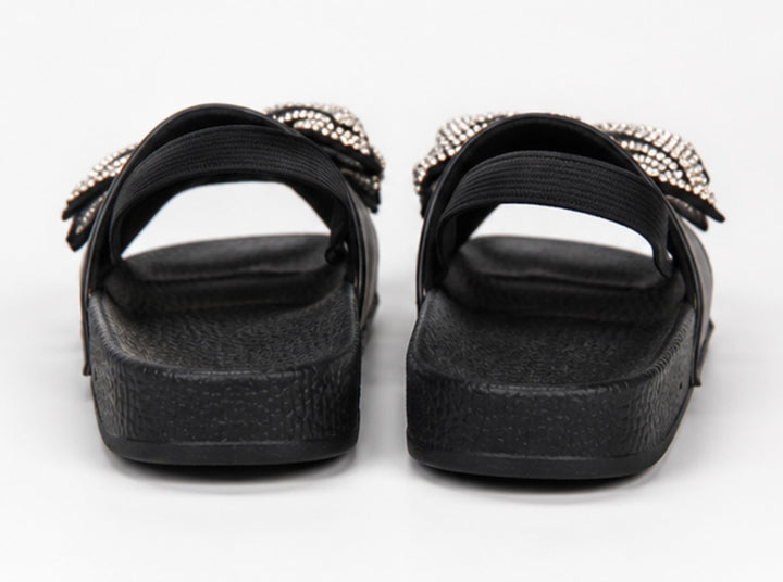 Black girls’ slider sandals with diamanté crystal bow detail and elastic back strap