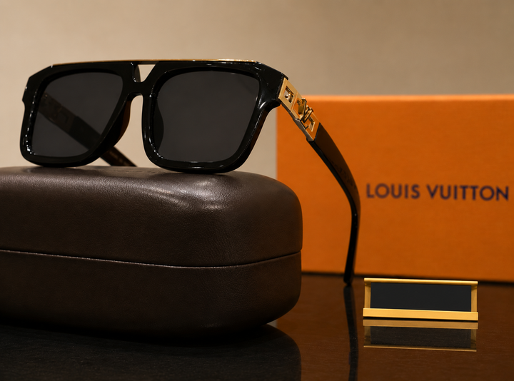 Black sunglasses with gold accents