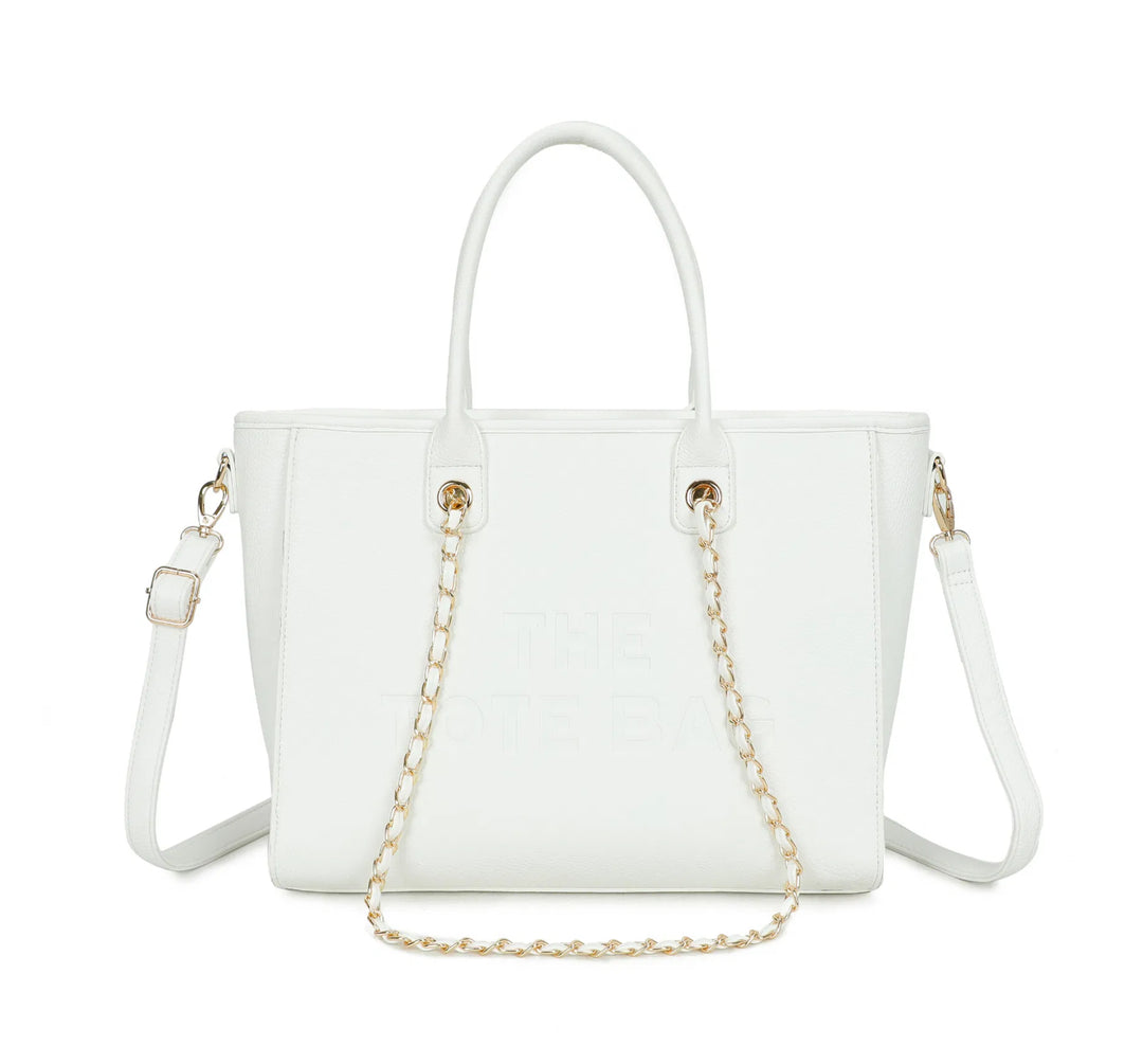 White handbag with gold chain detail 