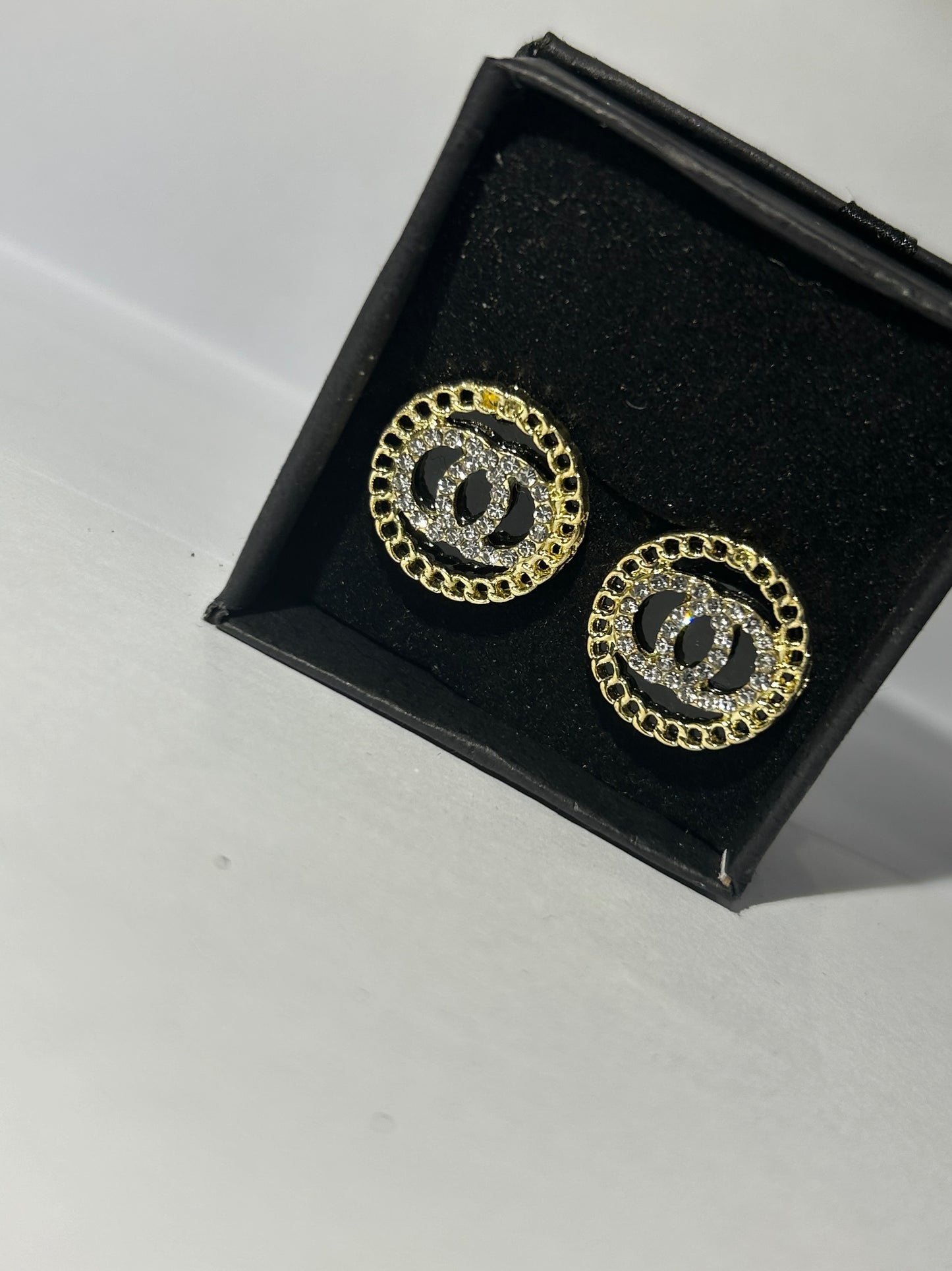 Black and gold circle earrings