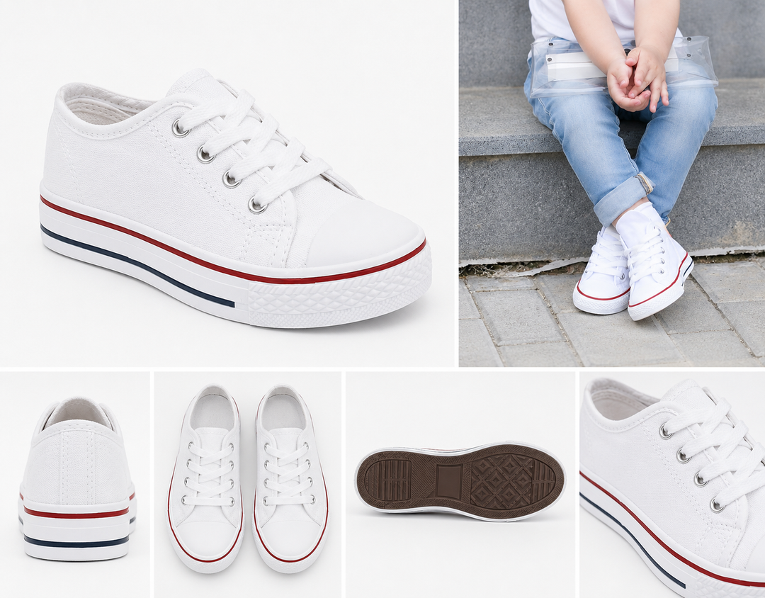 White kids canvas trainers with lace-up fastening and classic chunky sole design.