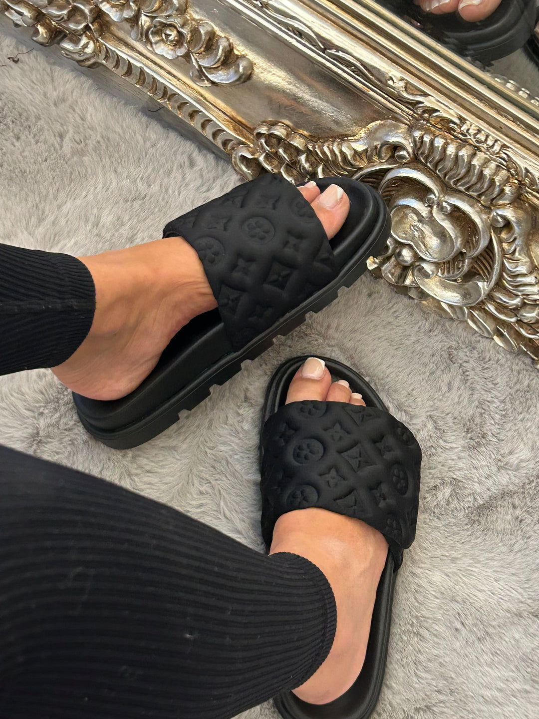 Black textured quilted slider sandals 